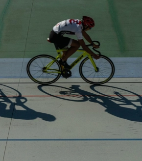 Captured is a cyclist in motion on a smooth cycling track, casting a long shadow in the bright sunlight. This amenity adds to the active lifestyle offered at Dosti West County Thane Balkum.